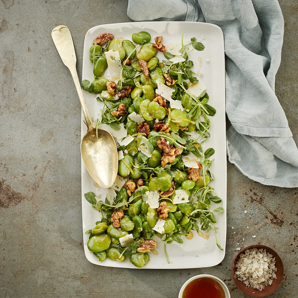 A plate of Early Spring Fava Bean, Pea Tendril & Toasted Walnut Salad